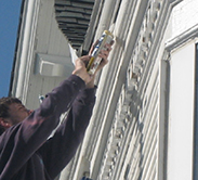 One of our experts providing exterior painting services in Minneapolis, MN